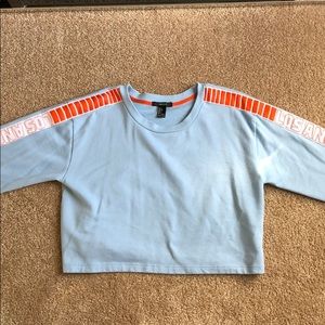 Baby blue cropped sweatshirt